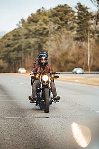 man and woman riding on motorcycle thumbnail