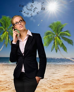 woman holding phone with coconut tree background in beach thumbnail