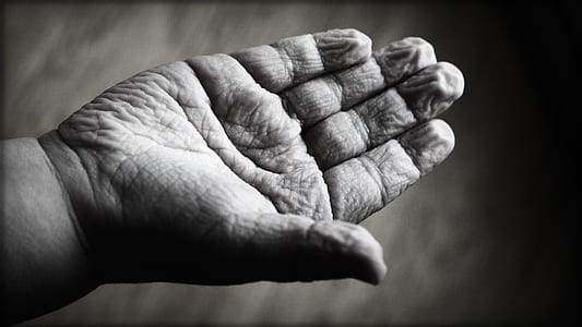 right human palm in grayscale photography thumbnail