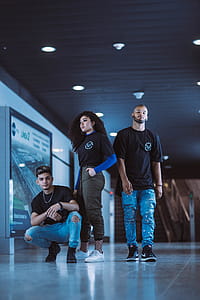 Two Man And Woman Taking Group Photo thumbnail