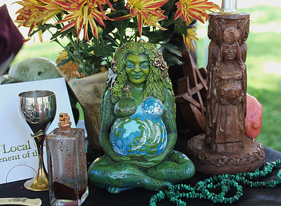 close up photo of Mother Earth figurine thumbnail