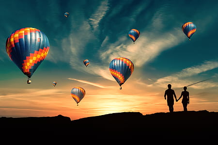 blue, yellow, and orange hot air baloons thumbnail