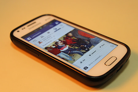 white Samsung Galaxy Android smartphone on table thumbnail