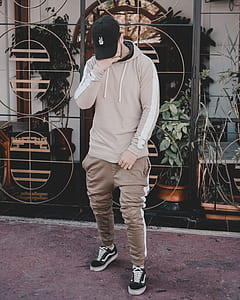 man wearing cap and holding his face thumbnail