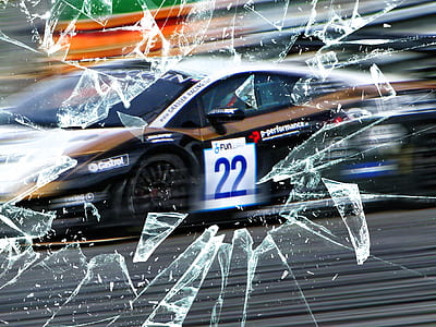 black and white stock car on road thumbnail