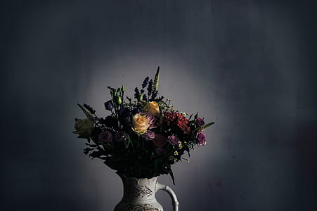 yellow and red rose in vase thumbnail