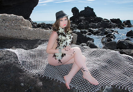 woman sitting on white mesh net thumbnail
