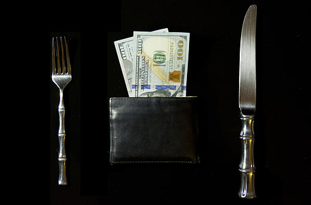 black leather bi-fold wallet with stainless steel fork and knife thumbnail