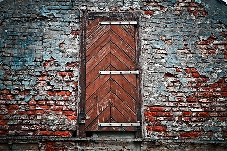 closed brown wooden door thumbnail
