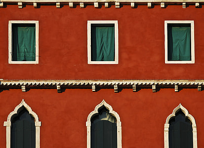 red and white concrete building at daytime thumbnail