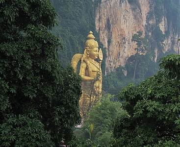 Hindu God statue near mountain thumbnail