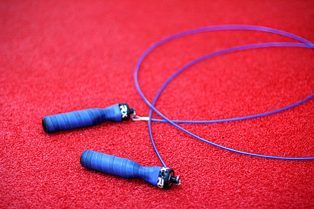 blue RX jumping ropes on red surface thumbnail