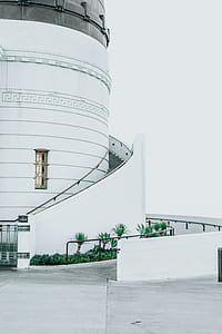 selective focus photography of spiral stairs building thumbnail