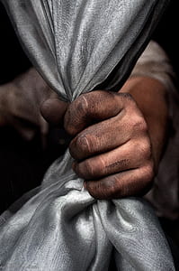 man gripping grey textile illustration thumbnail