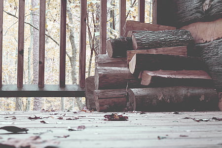 firewood stack beside railing thumbnail