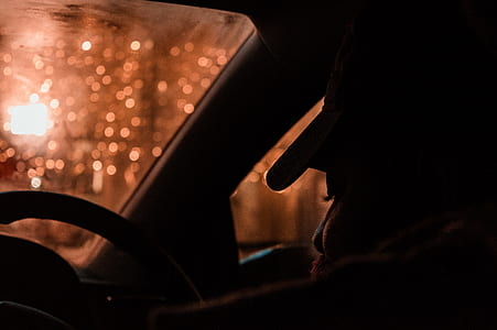 person sitting in front of steering wheel thumbnail