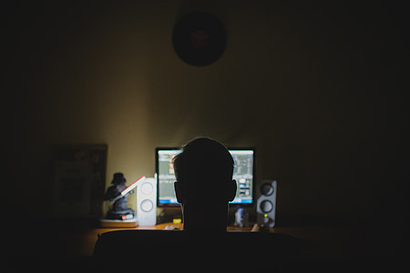 man playing online games on computer thumbnail