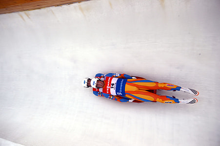 two men in cart sliding in slide thumbnail