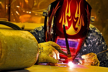 person using welder thumbnail