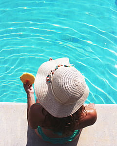 woman sitting in front swimming pool thumbnail