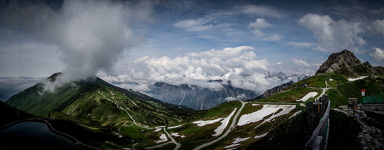 mountains near clouds during daytime thumbnail