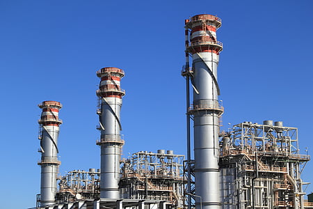 gray power plant under blue sky thumbnail