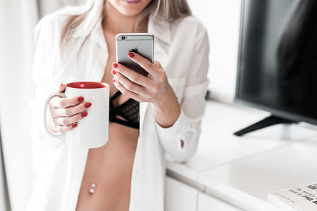 Woman Using Smartphone at Home thumbnail