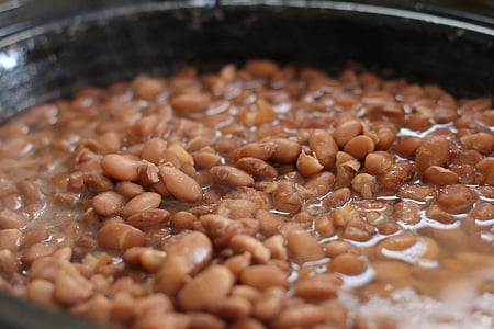 beans cooking on black pot thumbnail