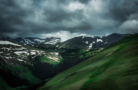 aerial view of mountain under gray sky during daytime thumbnail