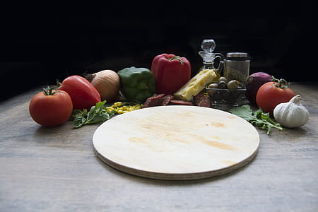 variety of spices beside chopping board thumbnail