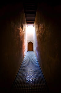 dim-lighted concrete hallway thumbnail