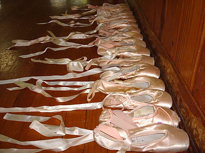 pairs of pink ballet shoes thumbnail