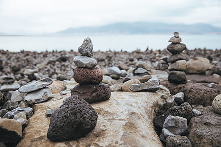Stone Sculptures On Beach Photo thumbnail