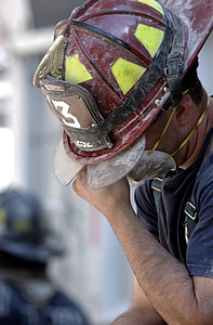 man wearing red and yellow hard hat thumbnail