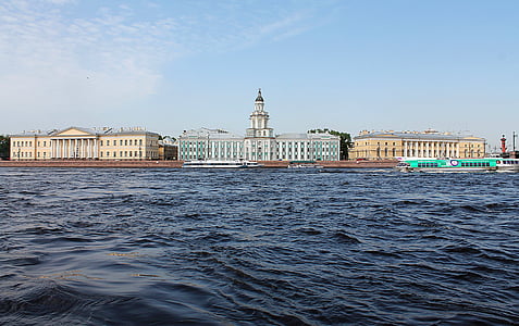 white cathedral near body of water thumbnail