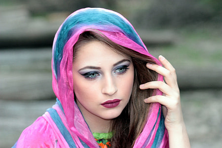 selective focus photography of woman in pink hijab thumbnail