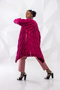 Woman Wearing Pink Knitted Coat thumbnail