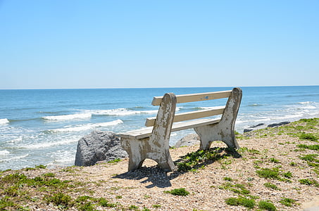 photography of bench on beach shore thumbnail