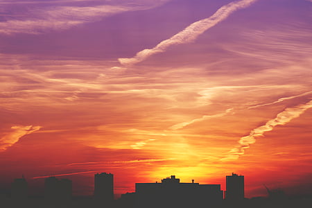 silhouette of buildings during golden hour thumbnail