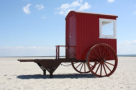 red carriage cabin near seashore during daytime thumbnail