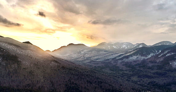 landscape photography of brown mountains at daytime thumbnail
