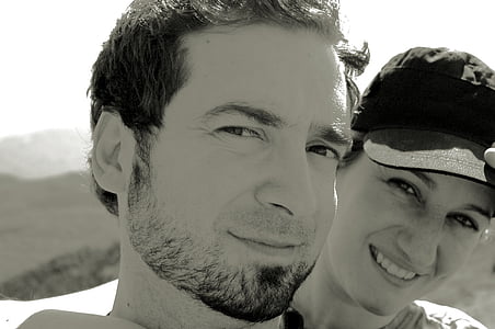 grayscale photography of man and woman thumbnail