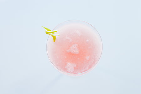 pink cocktail filled on drinking glass thumbnail