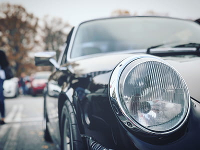 selective focus photography of black car thumbnail