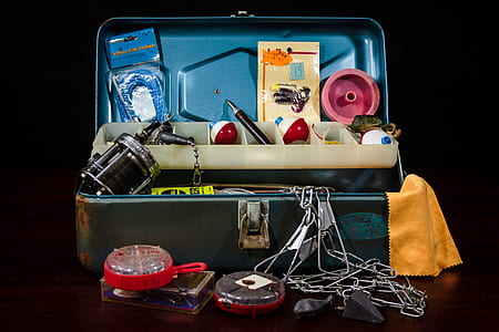 assorted fishing equipment in case thumbnail