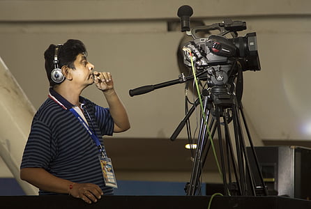 man looking at video recorder thumbnail
