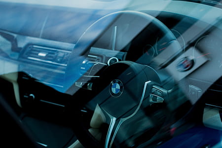 black BMW vehicle steering wheel display thumbnail
