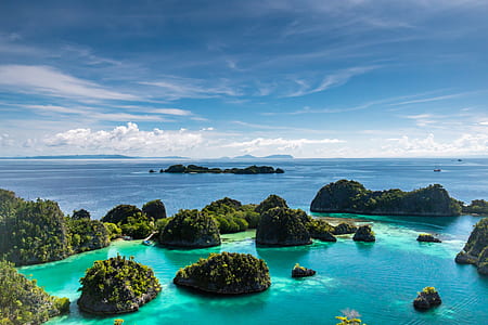 islets surrounded by body of water thumbnail