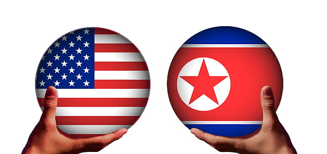 two hands holding American flag and flag wallpaper thumbnail