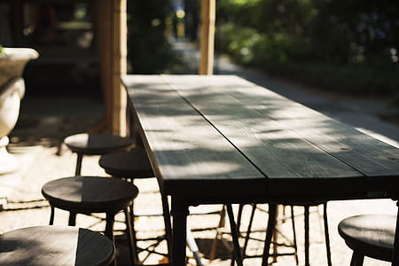 rectangular brown wooden dining table and chairs thumbnail